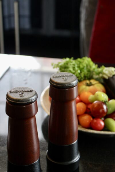 image of salt and pepper grinders for skeppshult in background is ingredients 