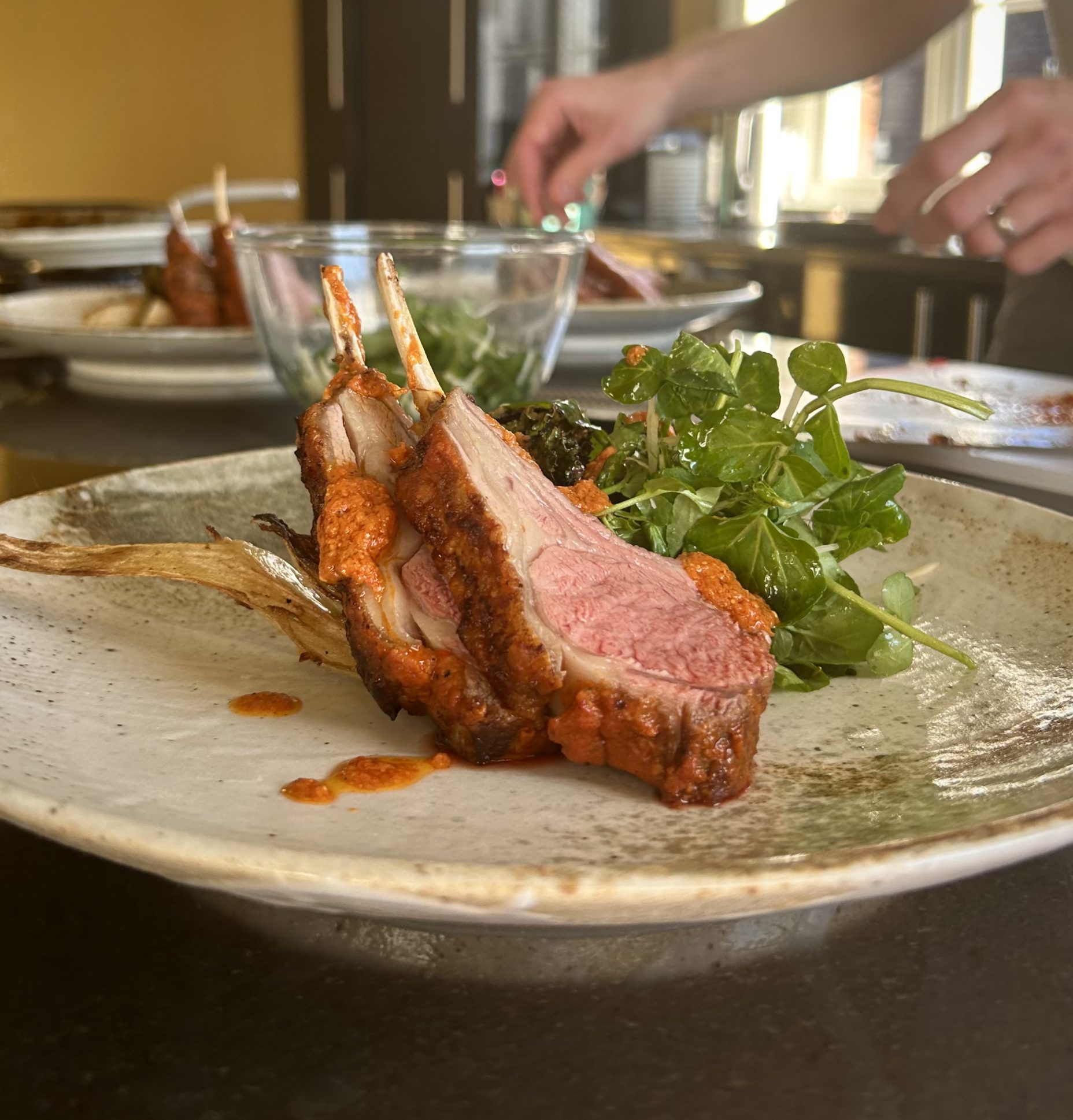 The d lamb rack, celeriac, fennel, roasted red pepper dip and watercress salad